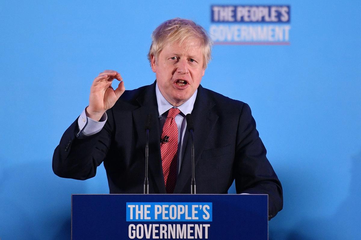 Prime Minister Boris Johnson hailed a political "earthquake" after securing a sweeping election win today Photo: DANIEL LEAL-OLIVAS/AFP via Getty Images