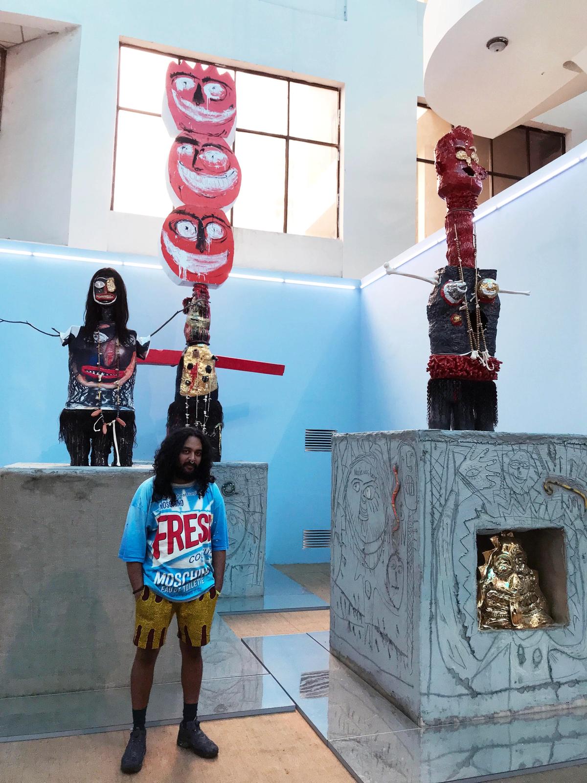 Ramesh Mario Nithiyendran in front of his works Gareth Harris