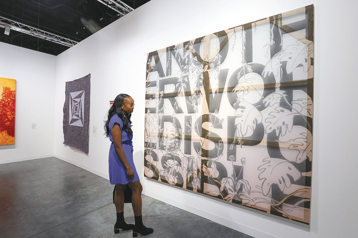 Painted silk for a work by Iván Argote was sent from his Paris studio and stretched over wooden frames on site at the fair, following shipping issues for Vermelho
Photo by Liliana Mora