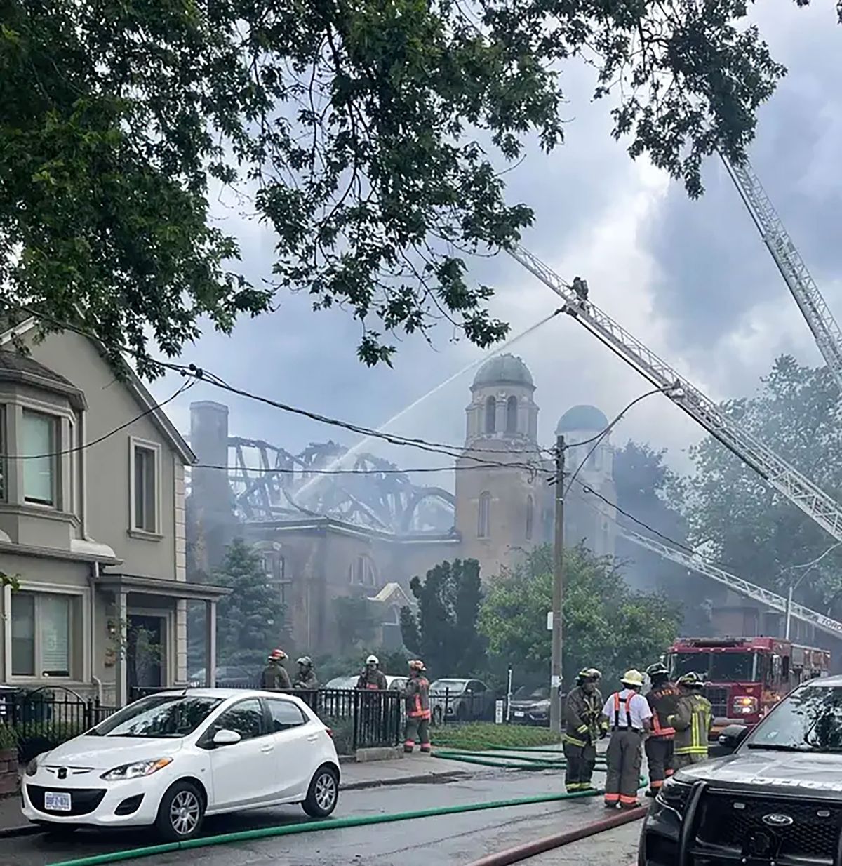 Firefighters battle the blaze at St Anne's Anglican Church in Toronto on 9 June Photo by VelvetGloveinTO, via Wikimedia Commons