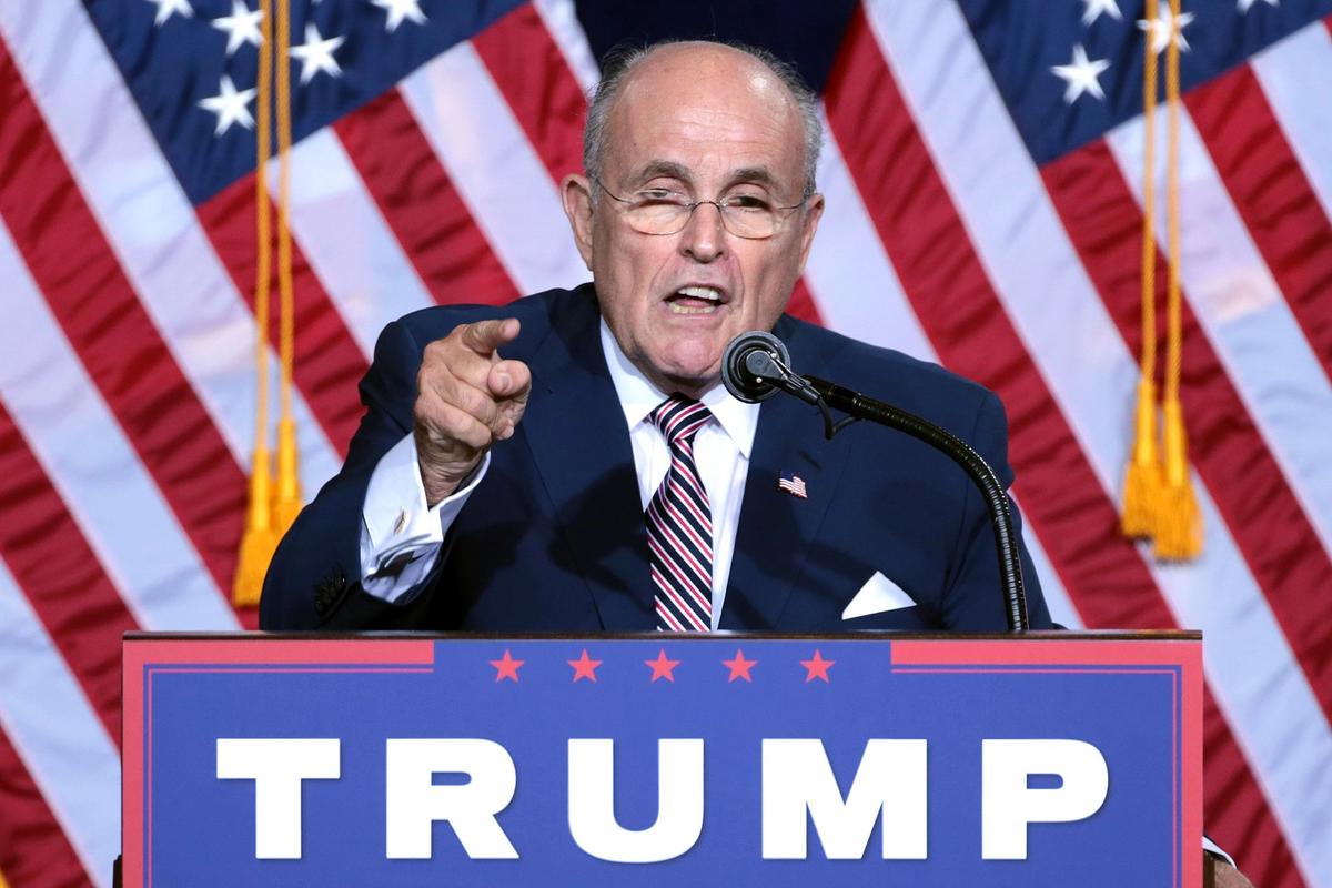 Giuliani speaking to supporters at an immigration policy speech hosted by Donald Trump at the Phoenix Convention Center in Arizona in 2016. Gage Skidmore/ Wikimedia