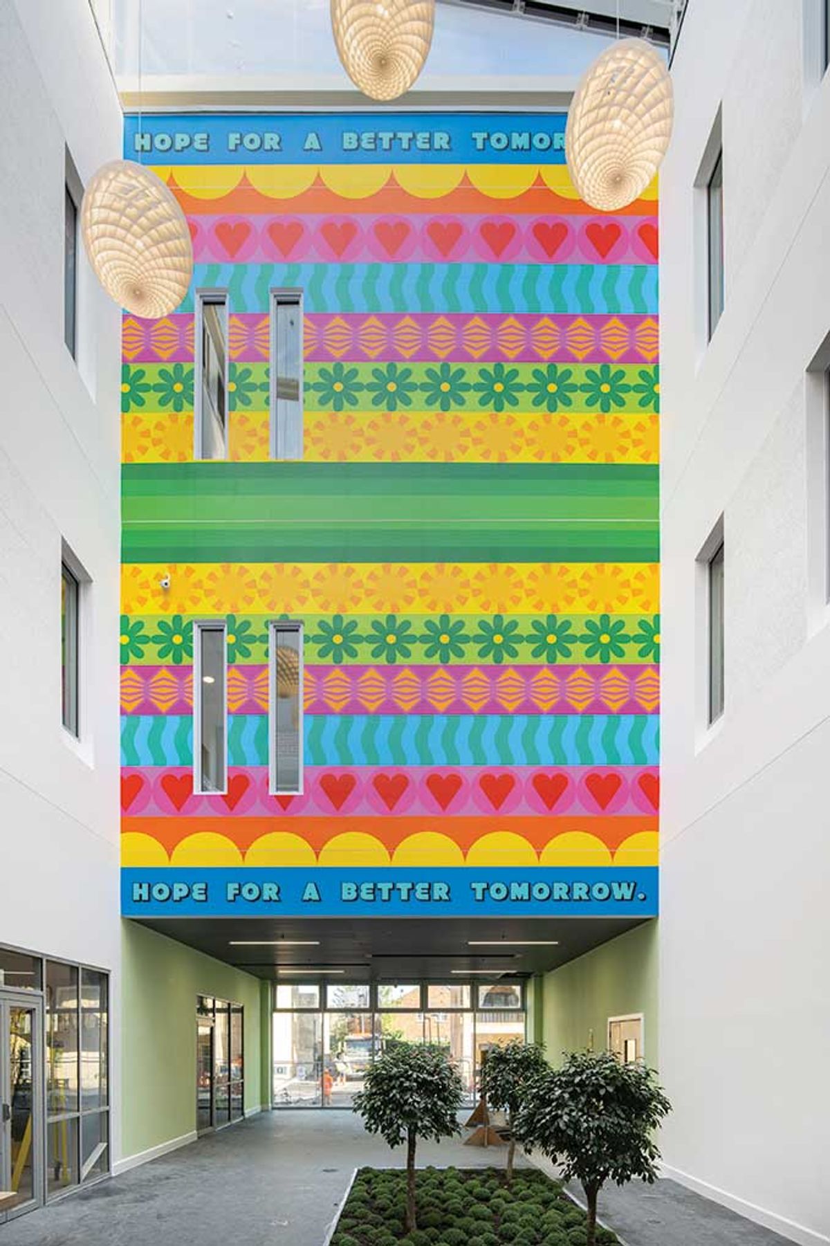 Yinka Ilori’s mural brings colour and cheer to London’s Springfield Hospital
Photo: Damian Griffiths. Courtesy of Hospital Rooms