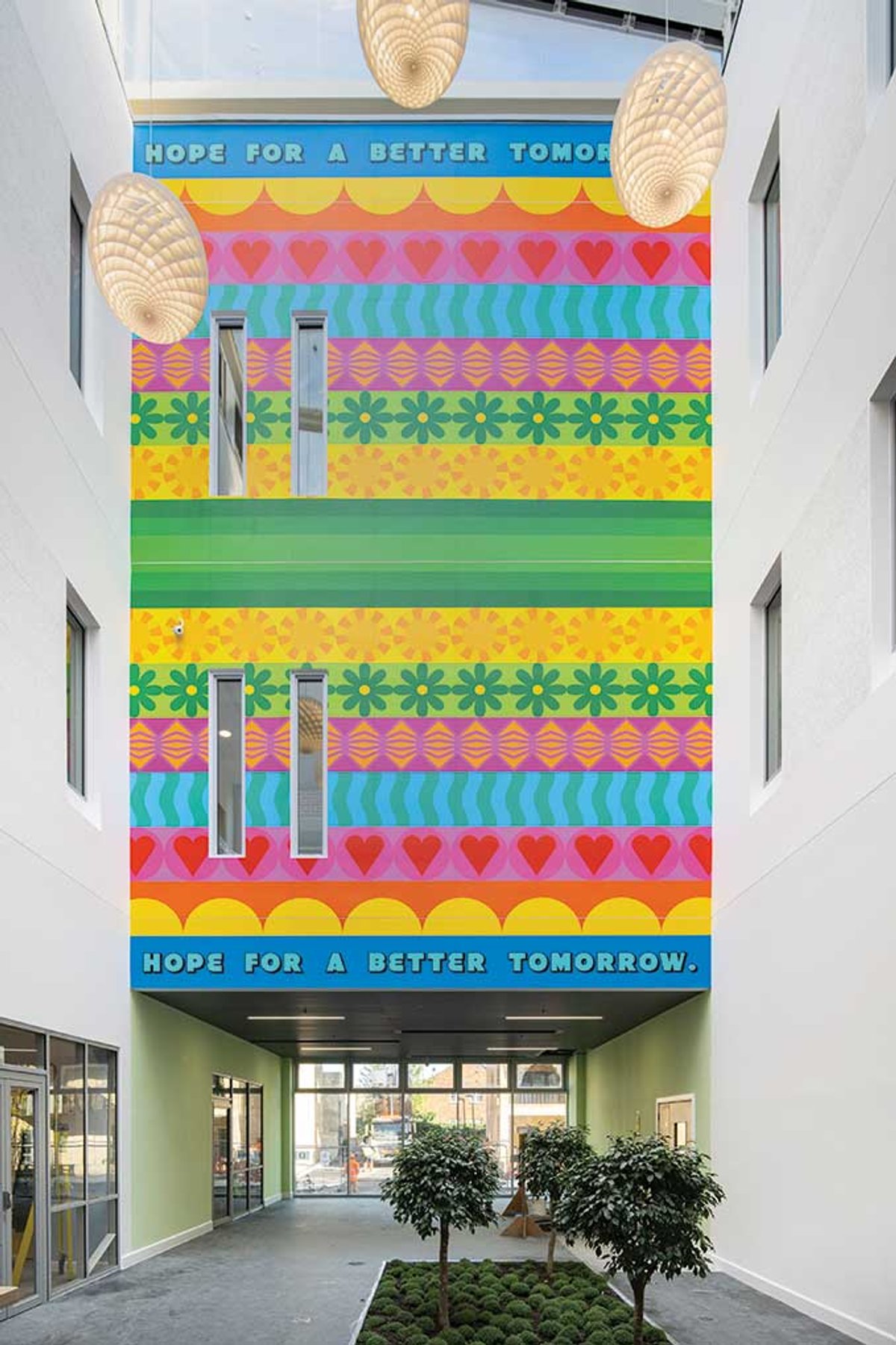 Yinka Ilori’s mural brings colour and cheer to London’s Springfield Hospital
Photo: Damian Griffiths. Courtesy of Hospital Rooms