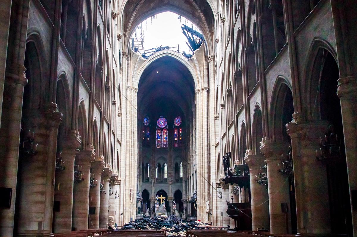 Although few ever saw the majestic timbers of the roof, their odor was as important as the stained glass and the spire in the aesthetic experience of Notre Dame © Christophe Petit Tesson, Pool via AP