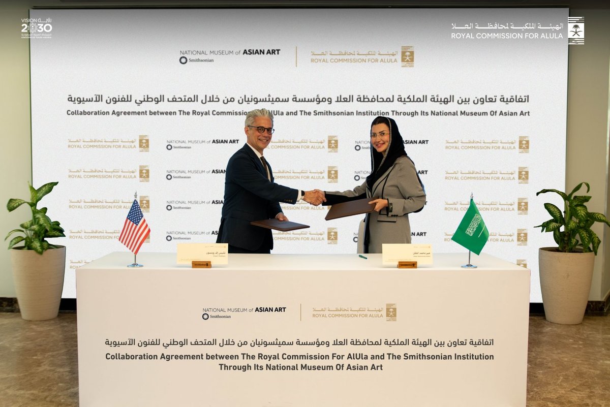 Chase Robinson (left), director of the Smithsonian's National Museum of Asian Art, and Abeer AlAkel (right), the chief executive of the Royal Commission for AlUla, sign a collaboration agreement to enhance cultural exchange and mutual understanding Royal Commission for AlUla.