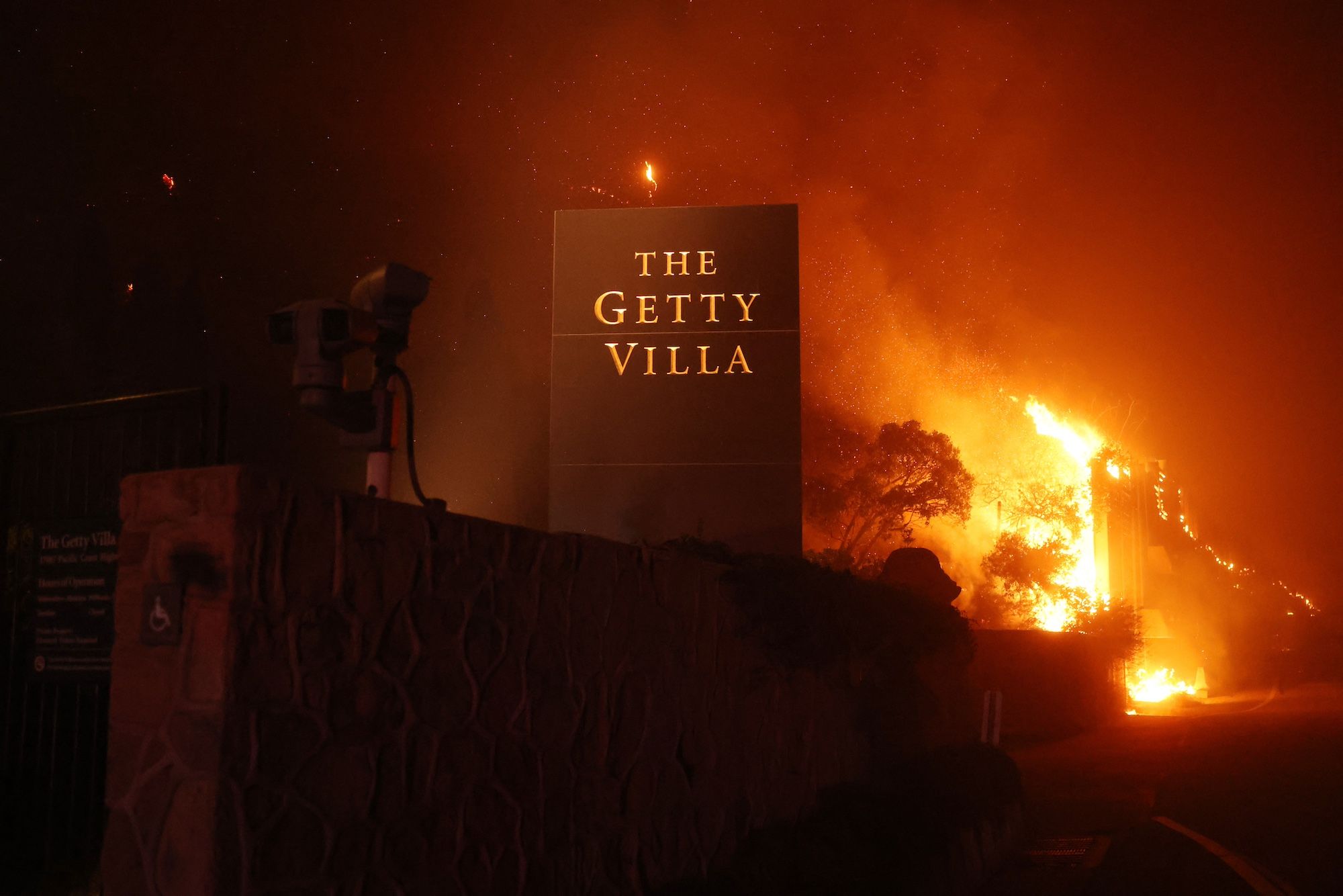 Flames from the Palisades fire threaten the Getty Villa on 7 January Photo by David Swanson / AFP, via Getty Images