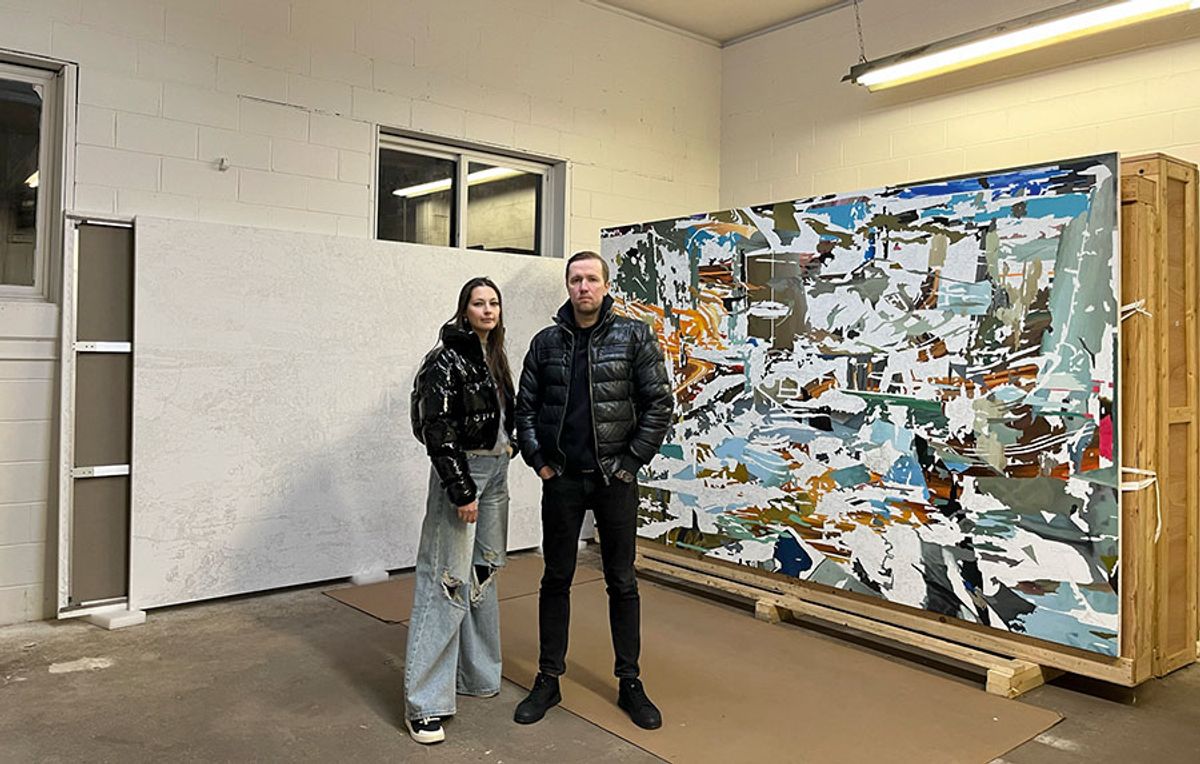 Maria Sharova and Dmitry Okruzhnov with a recent work in their new studio in Bellport, New York Courtesy the artists