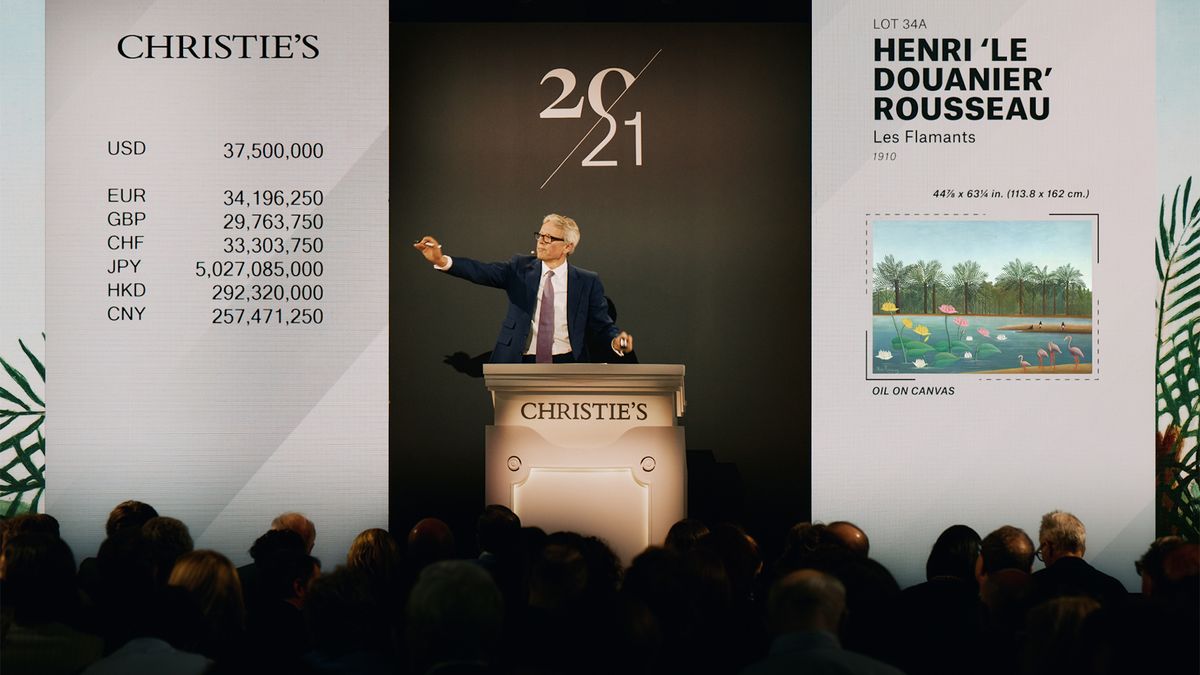 Christie's auctioneer Jussi Pylkkänen selling the night's top lot, Henri Rousseau's Les Flamants, for $37.5m ($43.5m with fees) Courtesy Christie's