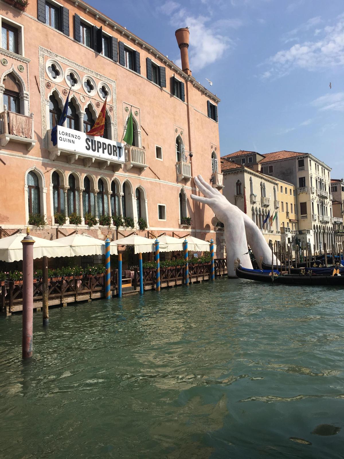 Lorenzo Quinn's installation Support (2017) at Ca' Sagredo palace in Venice during the 57th Venice Biennale Aimee Dawson