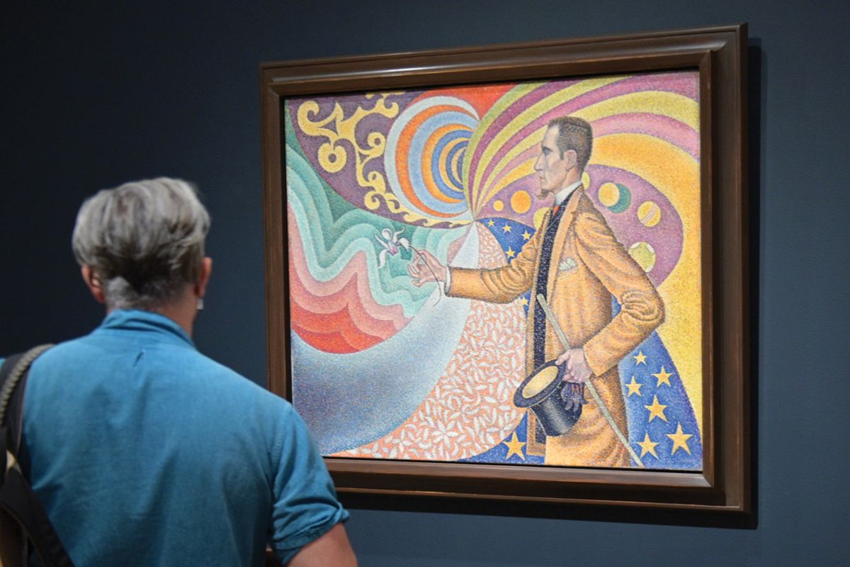 Signac’s 1890 portrait Opus 217. Against the Enamel of a Background Rhythmic with Beats and Angles, Tones, and Tints depicts Fénéon’s devotion to Neo-Impressionist colour theory Photo: Michael Loccisano/Getty Images