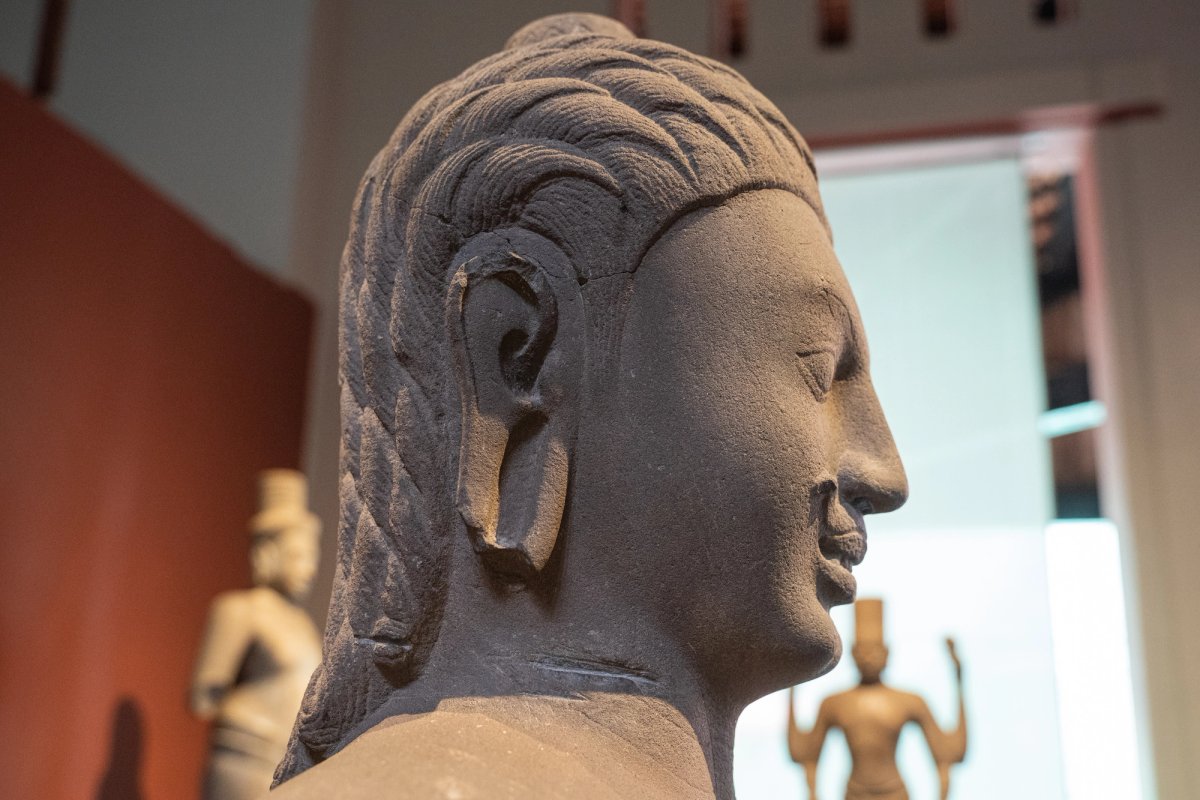 Yama (Leper King) statue with evidence of an attempt to saw its head on display at the National Museum of Cambodia in Phnom Penh, Cambodia Photo: Cindy Liu/Special to The Denver Post