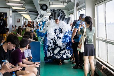 Artist Pat Oleszko leads climate-themed Pride performance aboard New York’s Staten Island Ferry 