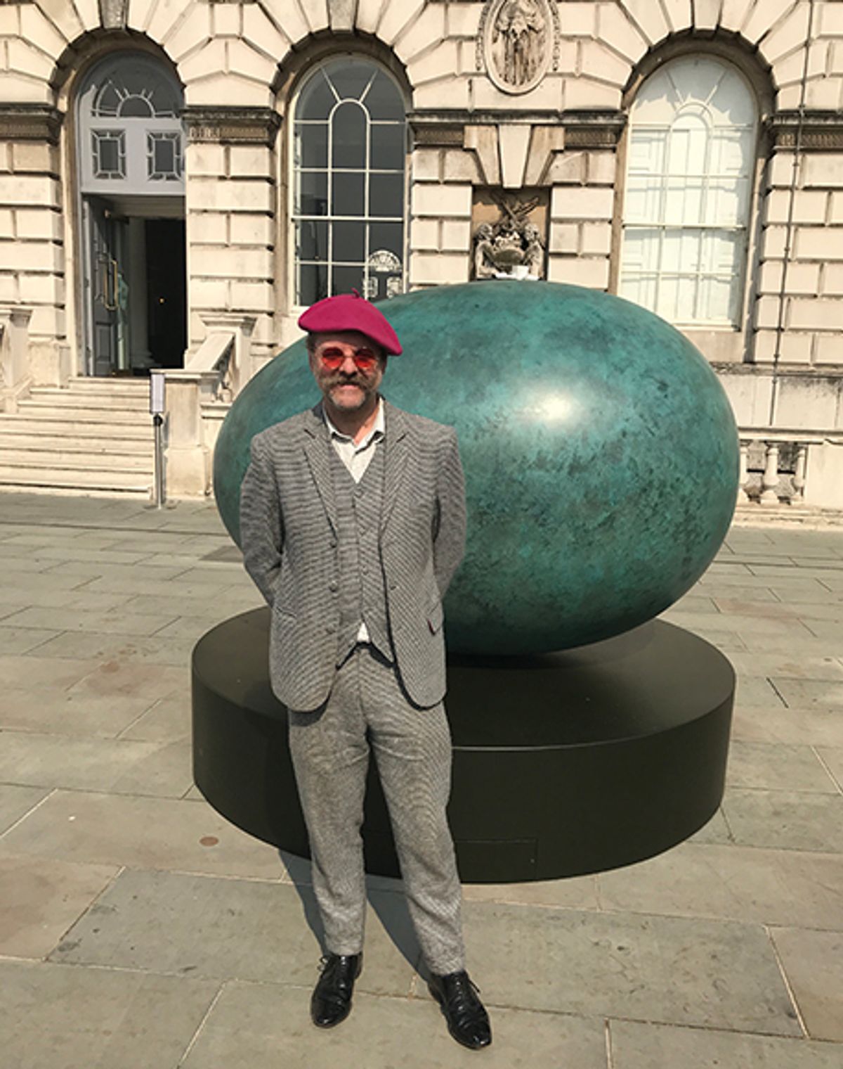 Gavin Turk in front of Oeuvre (Verdigris) (2018) Courtesy of Louisa Buck