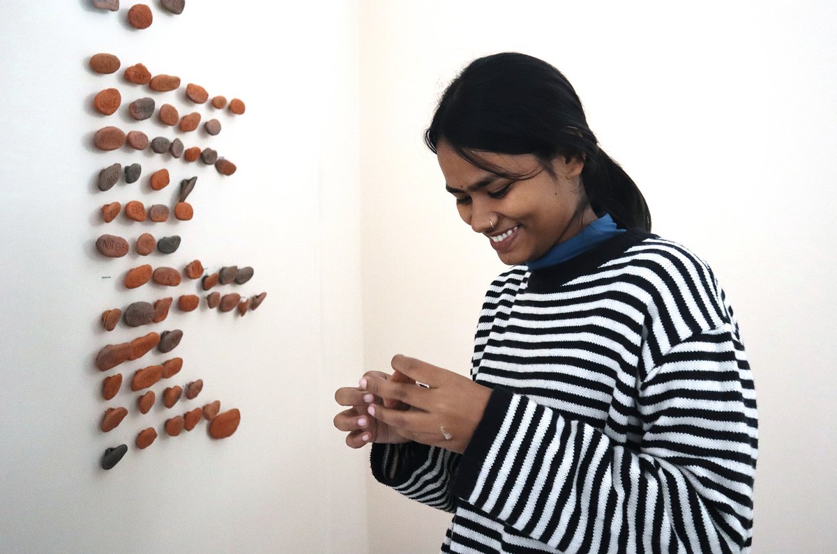 Artist Srishti Gupta, aged 28, was arrested after a protest by thousands of factory workers in the city of Noida, who were demanding fairer wages and improved work conditions © Sarmistha Bose