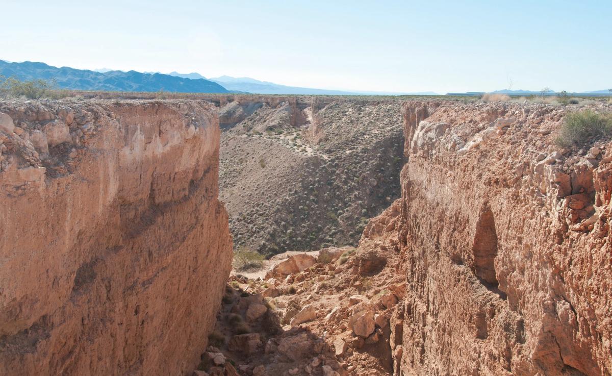 The north trench of Michael Heizer’s Double Negative, one of two 30ft-wide, 50ft-deep trenches created on the Mormon Mesa in 1969 Photo: Thure Johnson