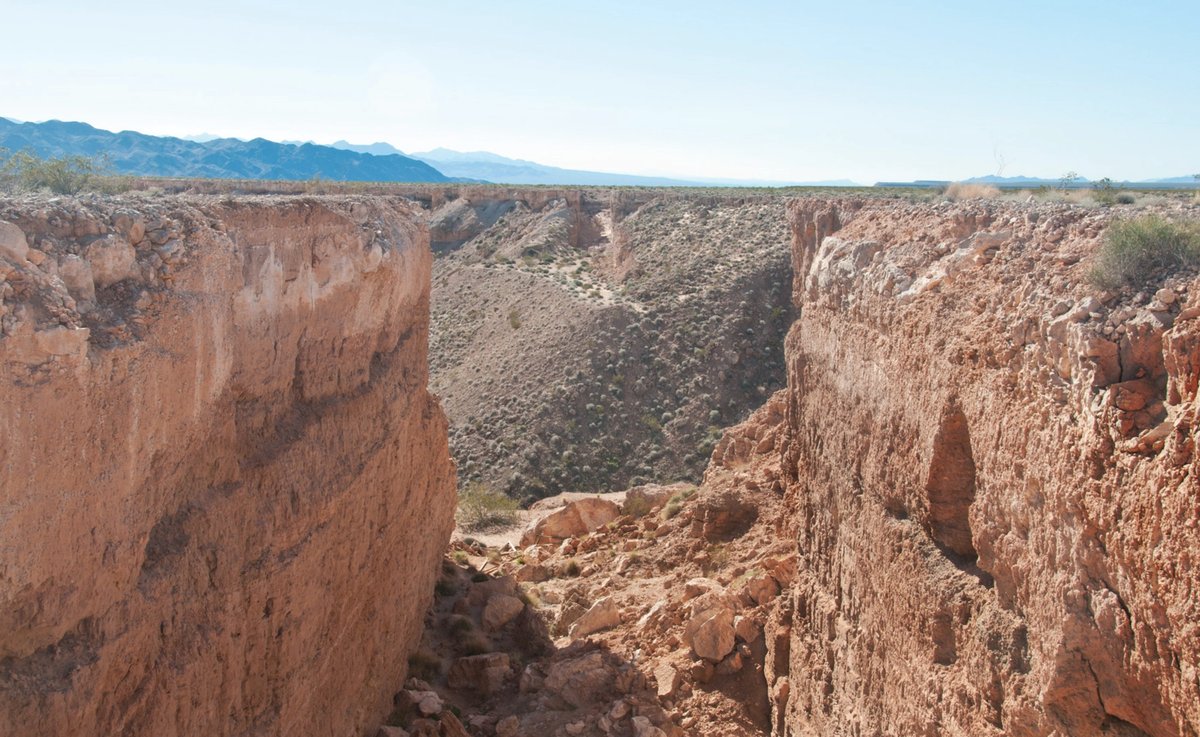 The north trench of Michael Heizer’s Double Negative, one of two 30ft-wide, 50ft-deep trenches created on the Mormon Mesa in 1969 Photo: Thure Johnson