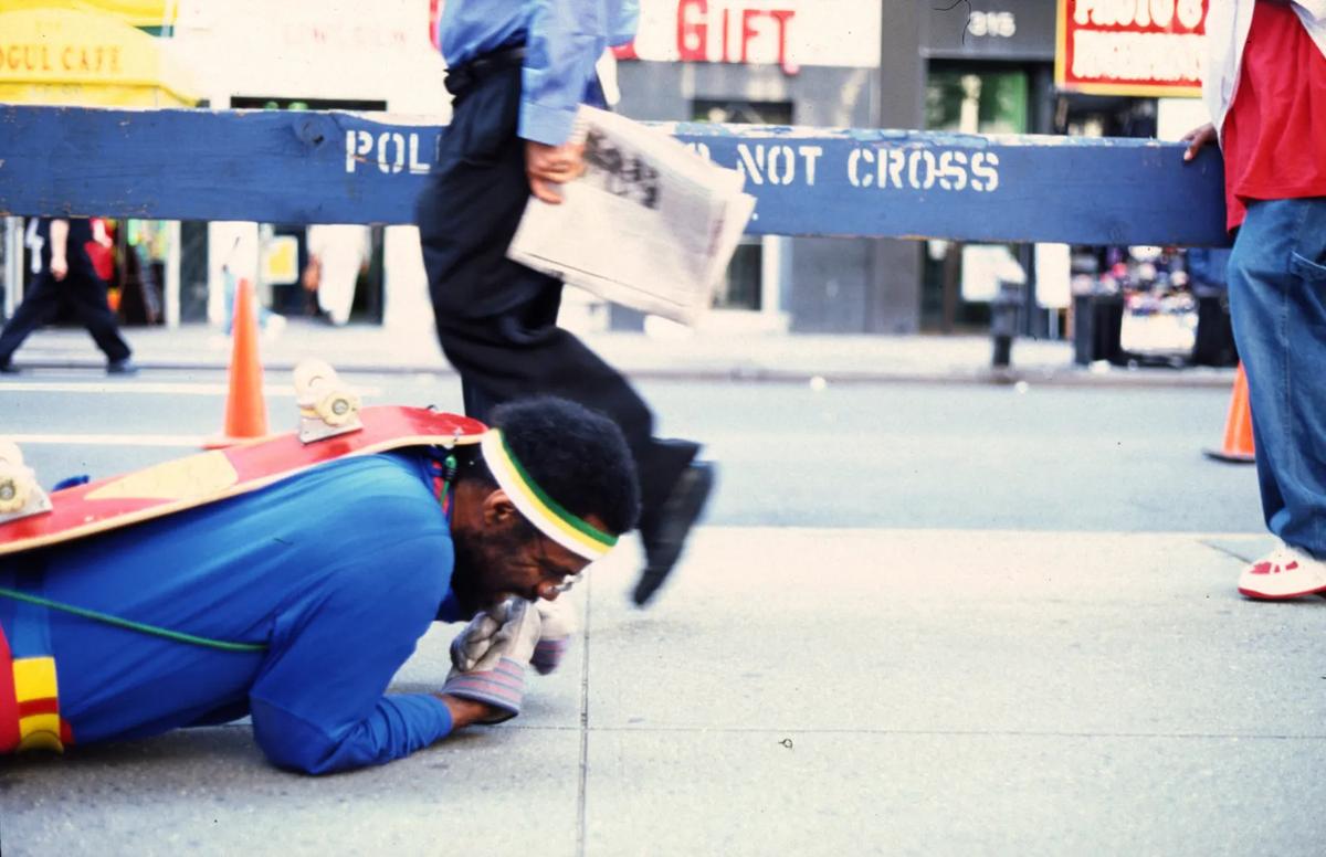 For The Great White Way, Pope.L donned a Superman costume and crawled all twenty-two miles from the Battery to his mother’s home in the Bronx. 
Courtesy Mitchell-Innes & Nash