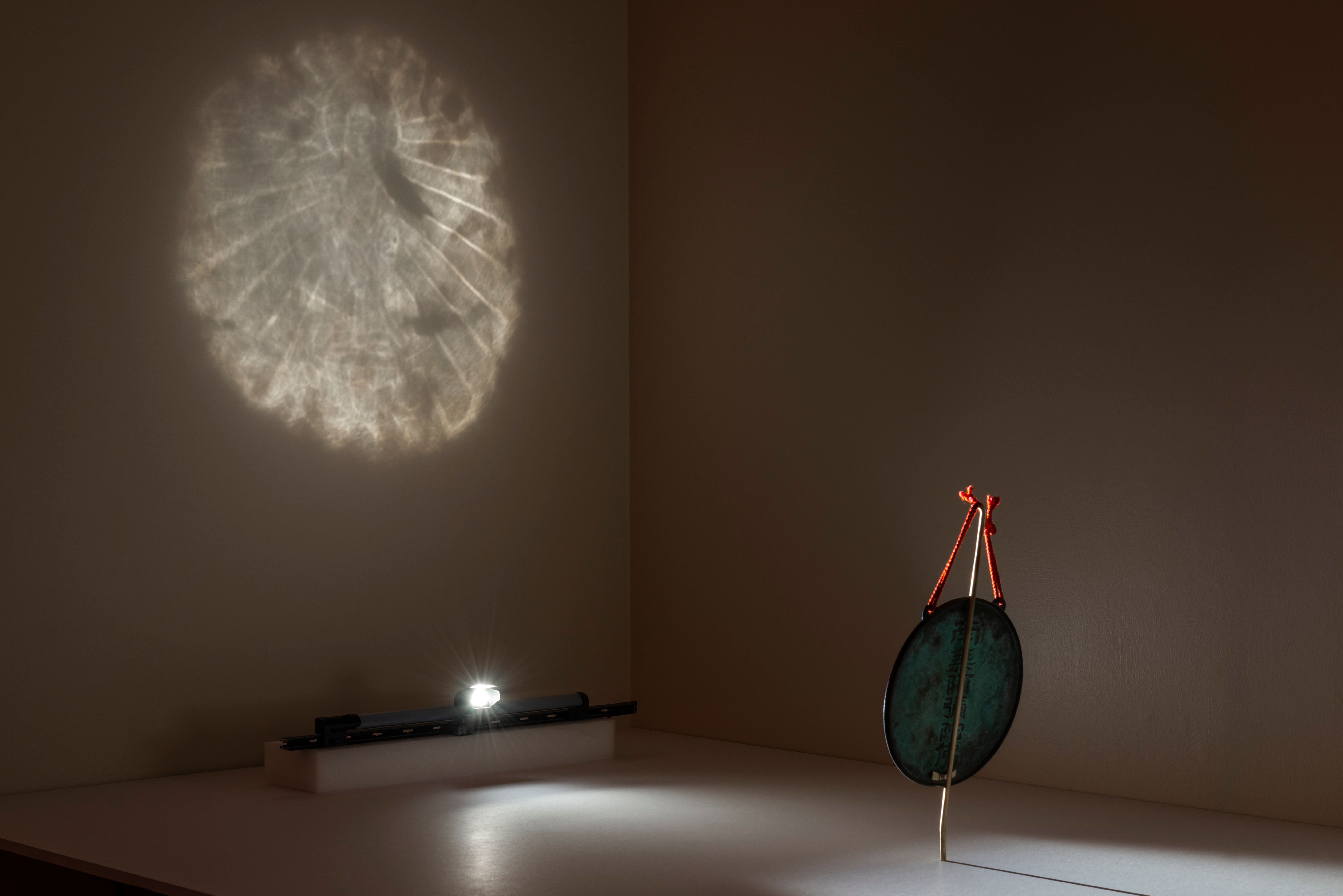 Previously undetectable invocation of Buddha discovered in cryptic ‘magic mirror’