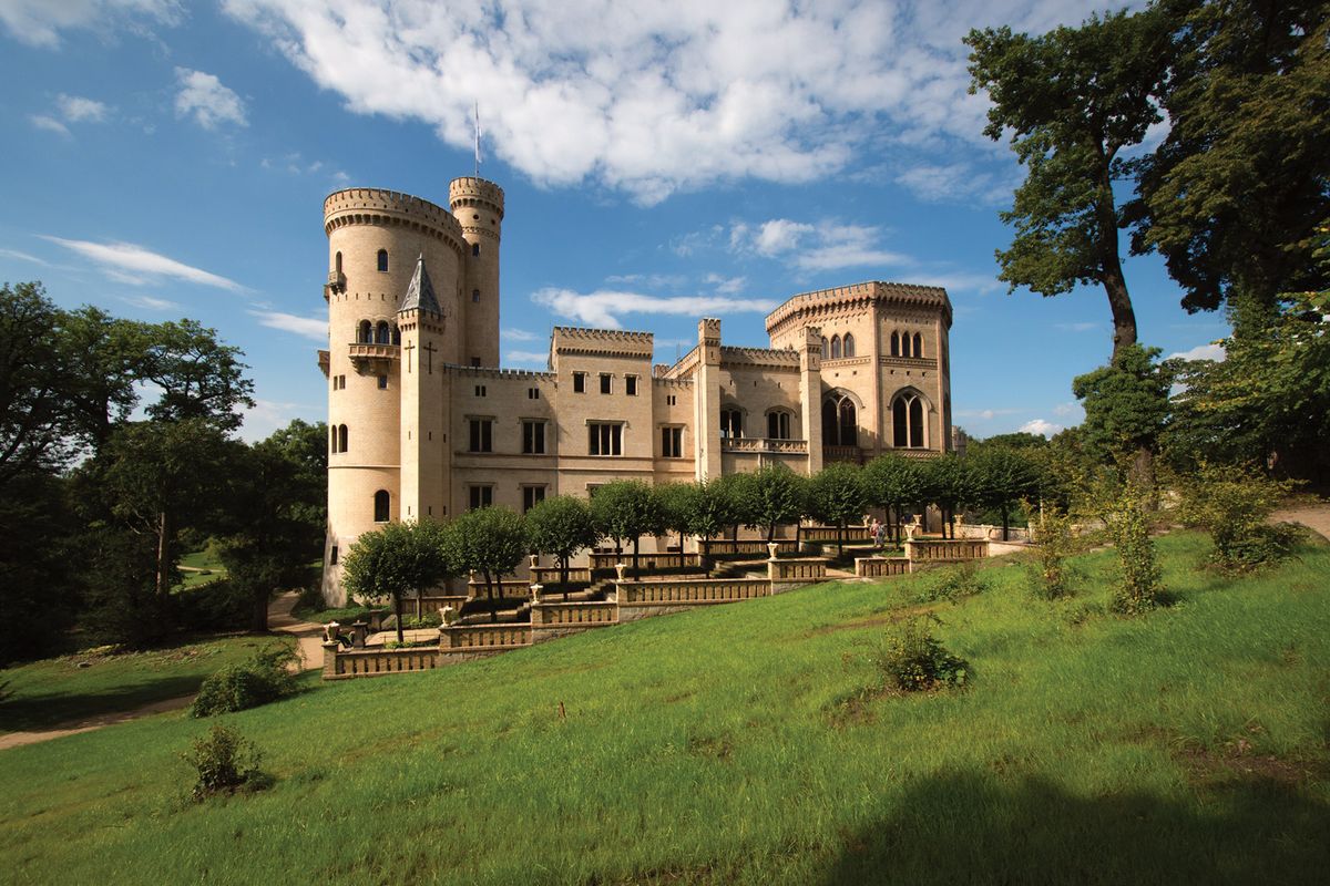 The restored exterior of the 19th-century Babelsberg Palace in Potsdam. The surrounding park, with its artificial lakes, waterfall and fountains, is being combed for bombs dropped by the Allies during wartime raids on Berlin Photo: Leo Seidel. © Stiftung Preußische Schlösser und Gärten