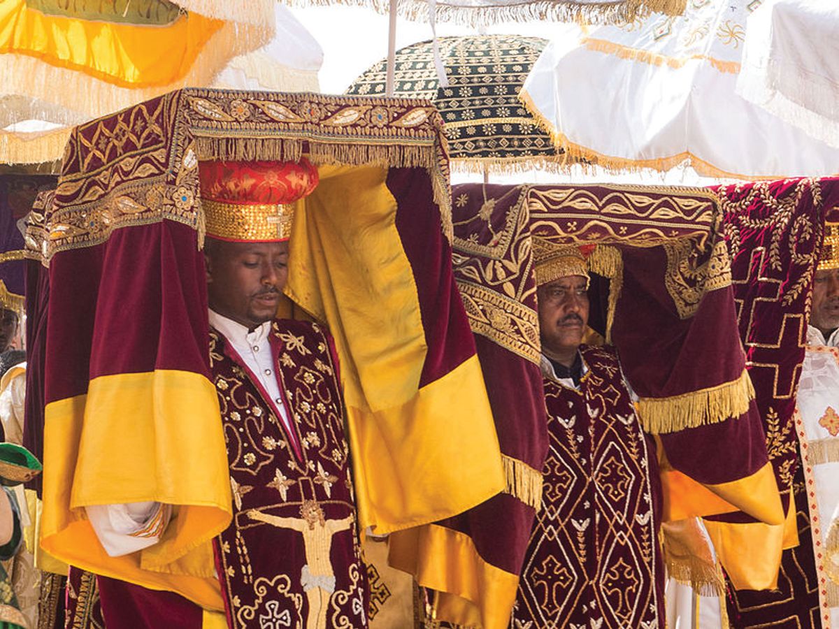 Priests in Addis Ababa carrying covered tabots on their heads during a celebration of the Epiphany © Jean Rebiffé