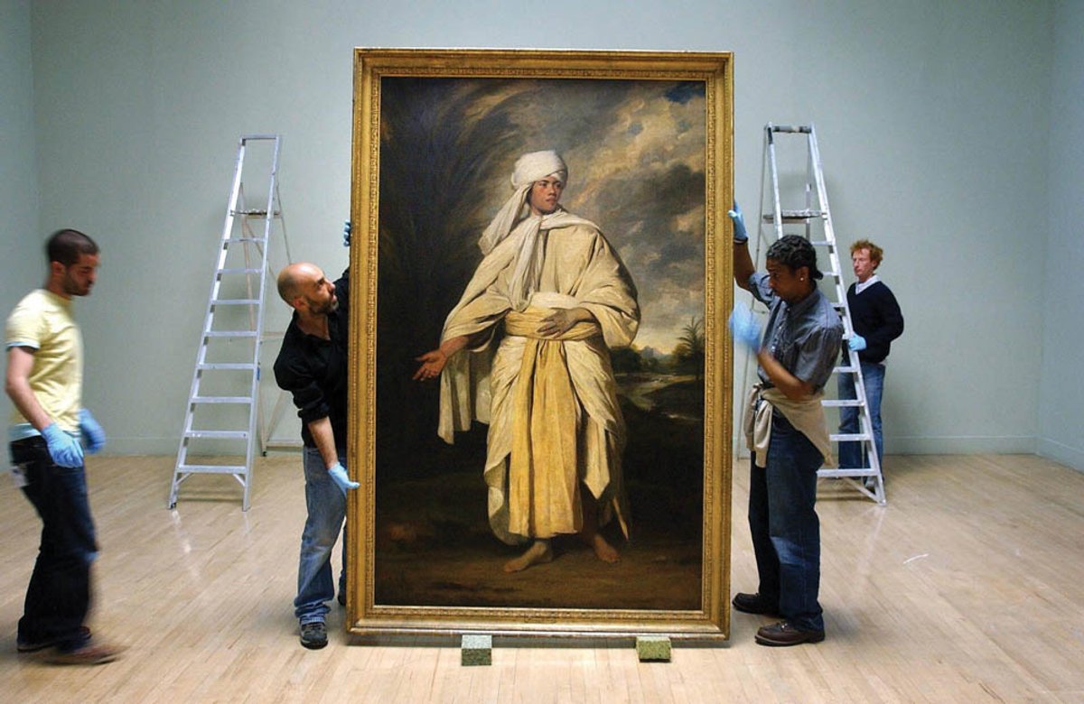 Joshua Reynolds’s Portrait of Omai seen here being prepared for an exhibition at Tate Britain in 2005, its last public UK outing. Omai was one of the first Polynesian visitors to Europe, travelling to Britain with Captain Cook, who was returning from an expedition in the 1770s.
Credit: PA Images / Alamy Stock Photo