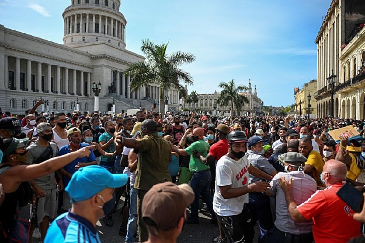 Thousands of Cubans took part in rare protests Sunday on 11 July 2021 against the government of Cuban President Miguel Diaz-Canel in Havana, chanting "Down with the dictatorship" and "We want liberty" Photo by YAMIL LAGE/AFP via Getty Images