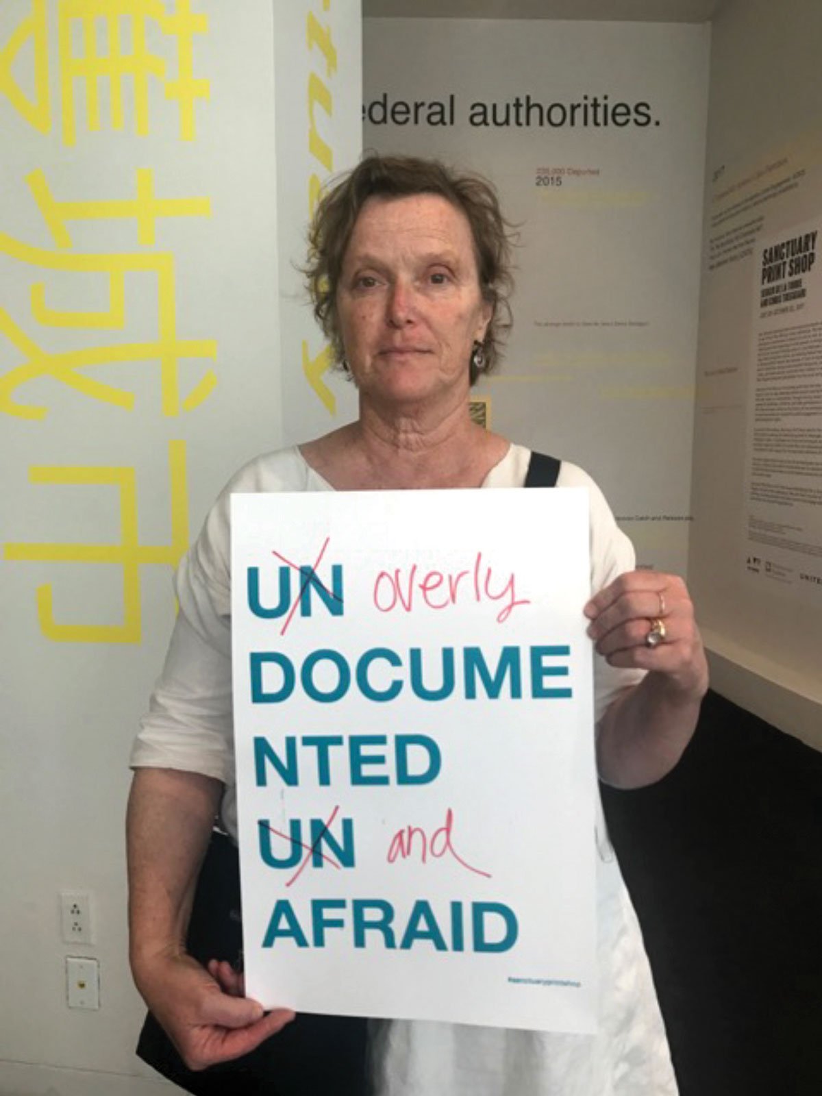 A participant at the Sanctuary Print Shop installation at the Yerba Buena Center for the Arts in San Francisco Courtesy of Sergio De La Torre and Chris Treggiari