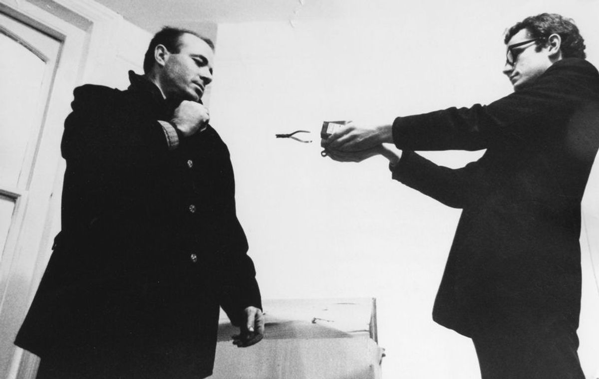 Guy Brett (right) in 1966 with the artist Takis © Clay Perry, England & Co gallery, London