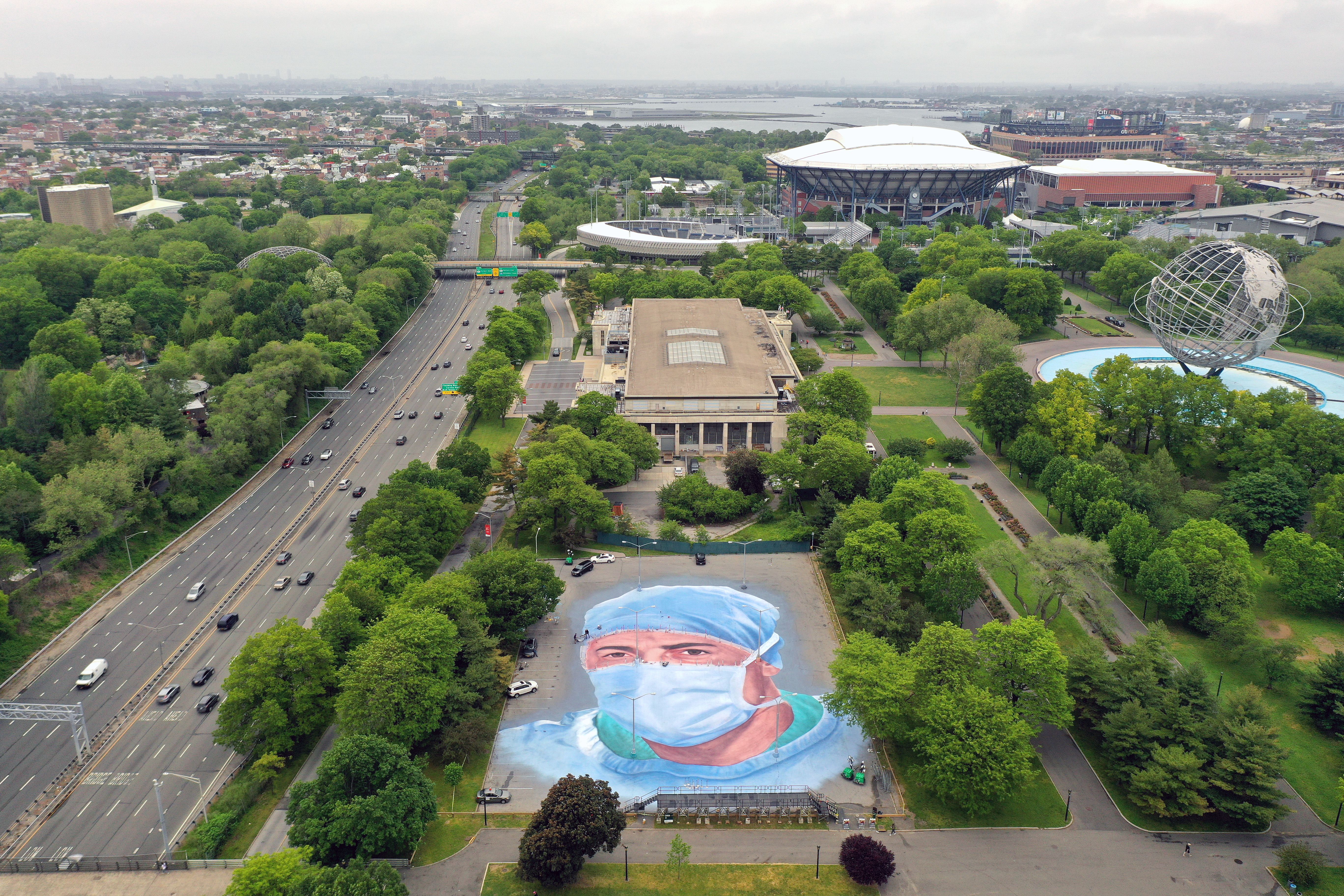 Somos La Luz, a mural by Jorge Rodriguez-Gerada depicting the Queens doctor Ydelfonso Decoo, who died on the frontlines of the coronavirus pandemic 