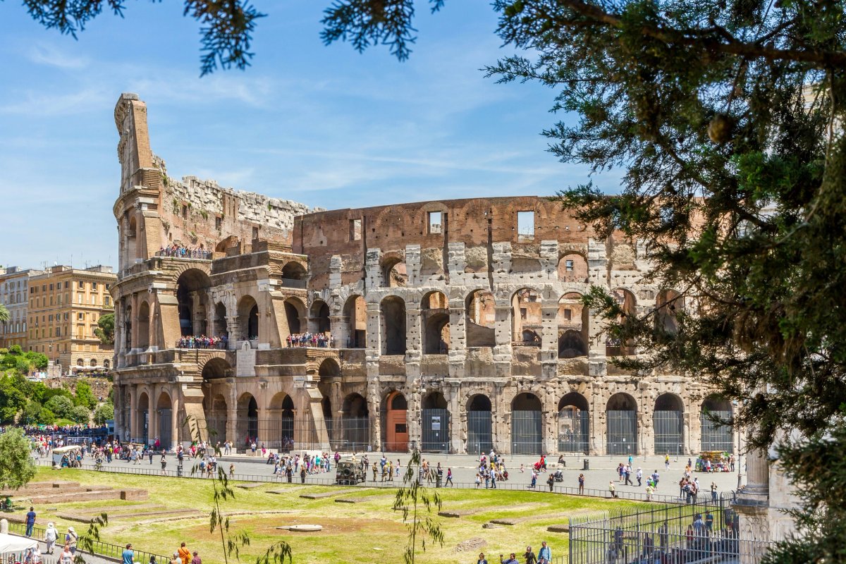 The Colosseum’s lower arches are blocked off by iron fences that taper into sharp spikes