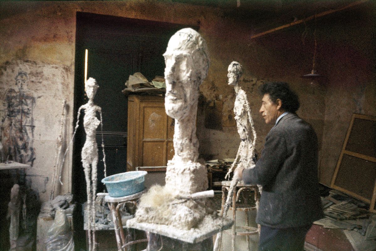 The artist in his studio on Rue Hippolyte-Maindron around 1960. Ernst Scheidegger/Giacometti Foundation Archives; © Giacometti Estate (Giacometti Foundation + ADAGP)
