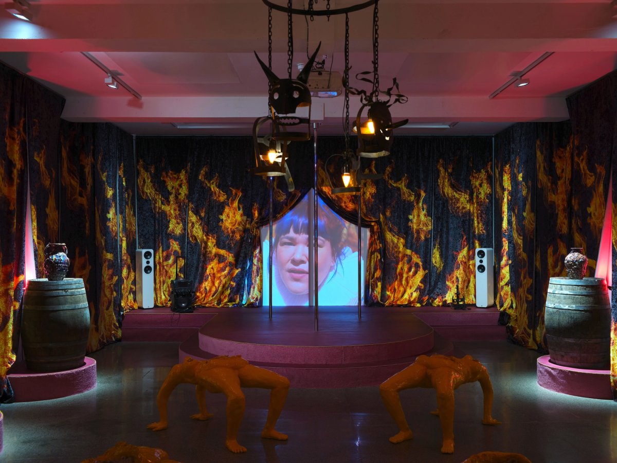 A projection of the artist Lindsey Mendick appears behind fiery curtains as part of her new solo show at Carl Freedman Gallery
Copyright of Lindsey Mendick, Courtesy of Carl Freedman Gallery, Margate. Photo: Ollie Harrop