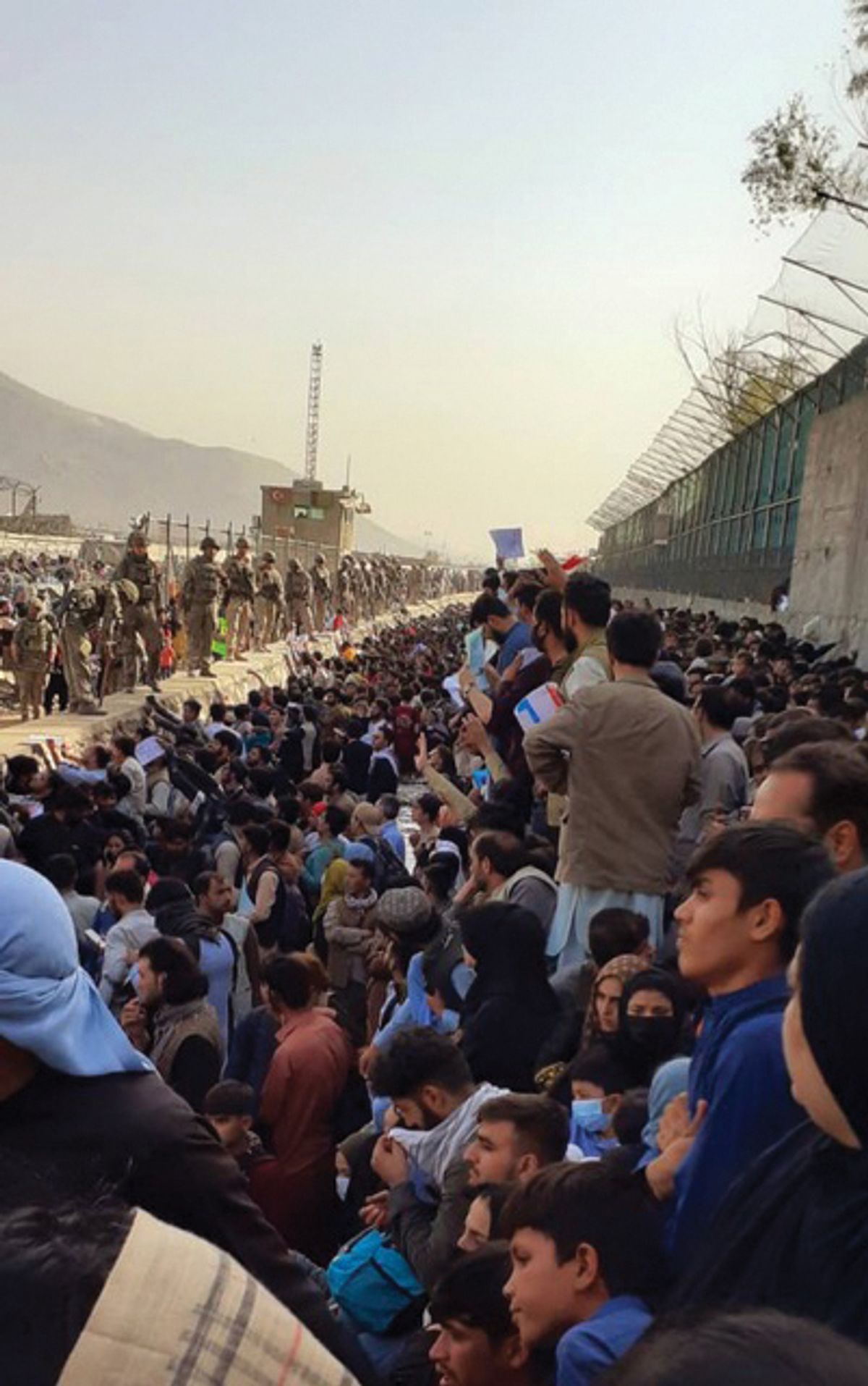 The crowds at Kabul airport’s Abbey Gate full of people hoping to board one of the evacuation flights last month