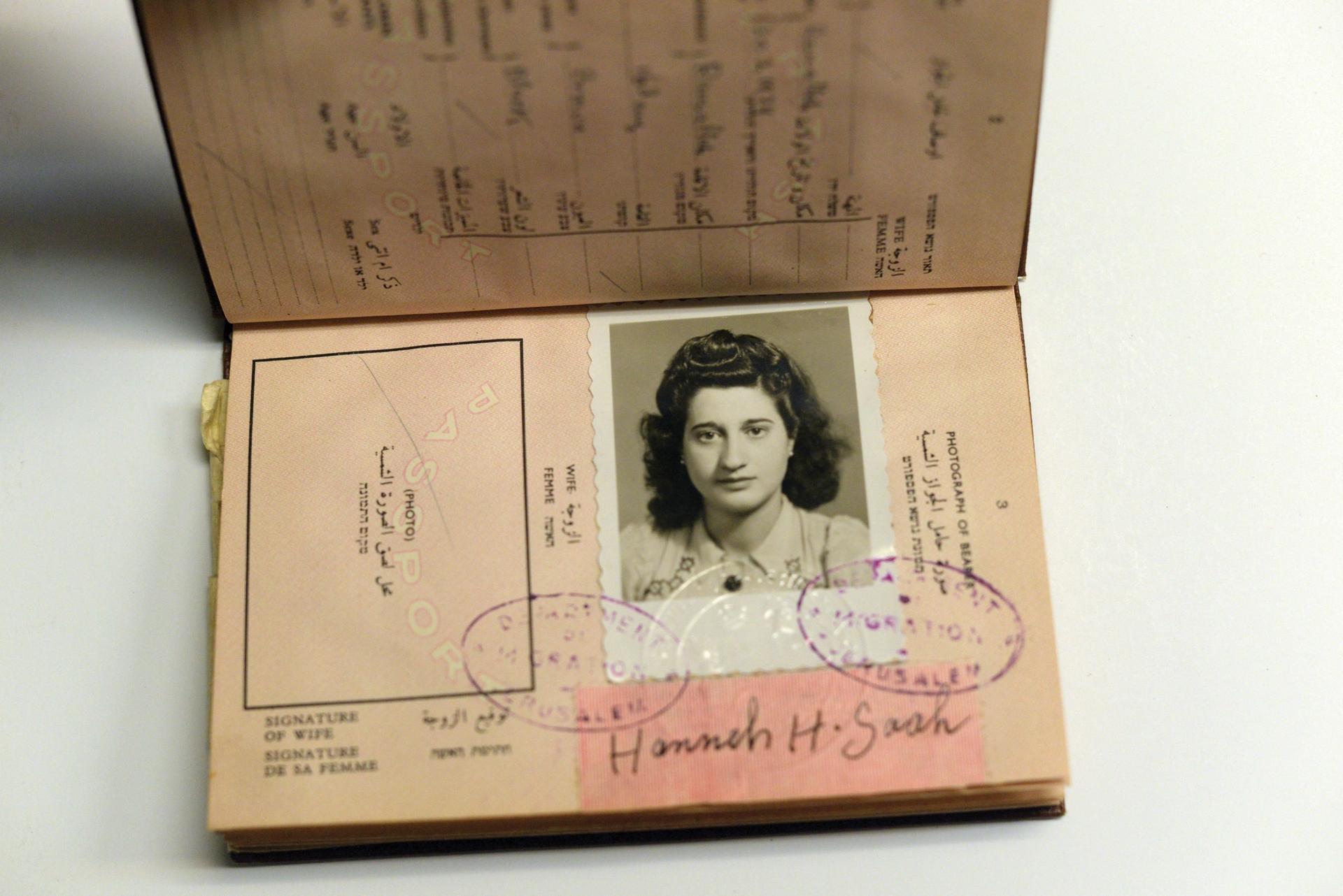 Exhibits include a 1946 British Mandate passport, issued to Palestinians during the existence of Mandatory Palestine, from 1929 until the creation of Israel in 1948 Courtesy of James F. Saah and family