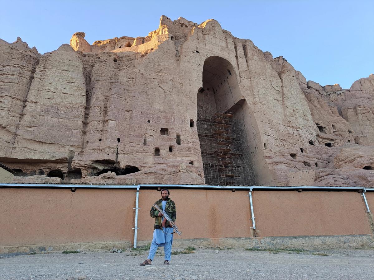 A Taliban appointed guard stands near the Western Buddha niche to enforce security on the site and prevent illegal activities including looting Sarvy Geranpayeh