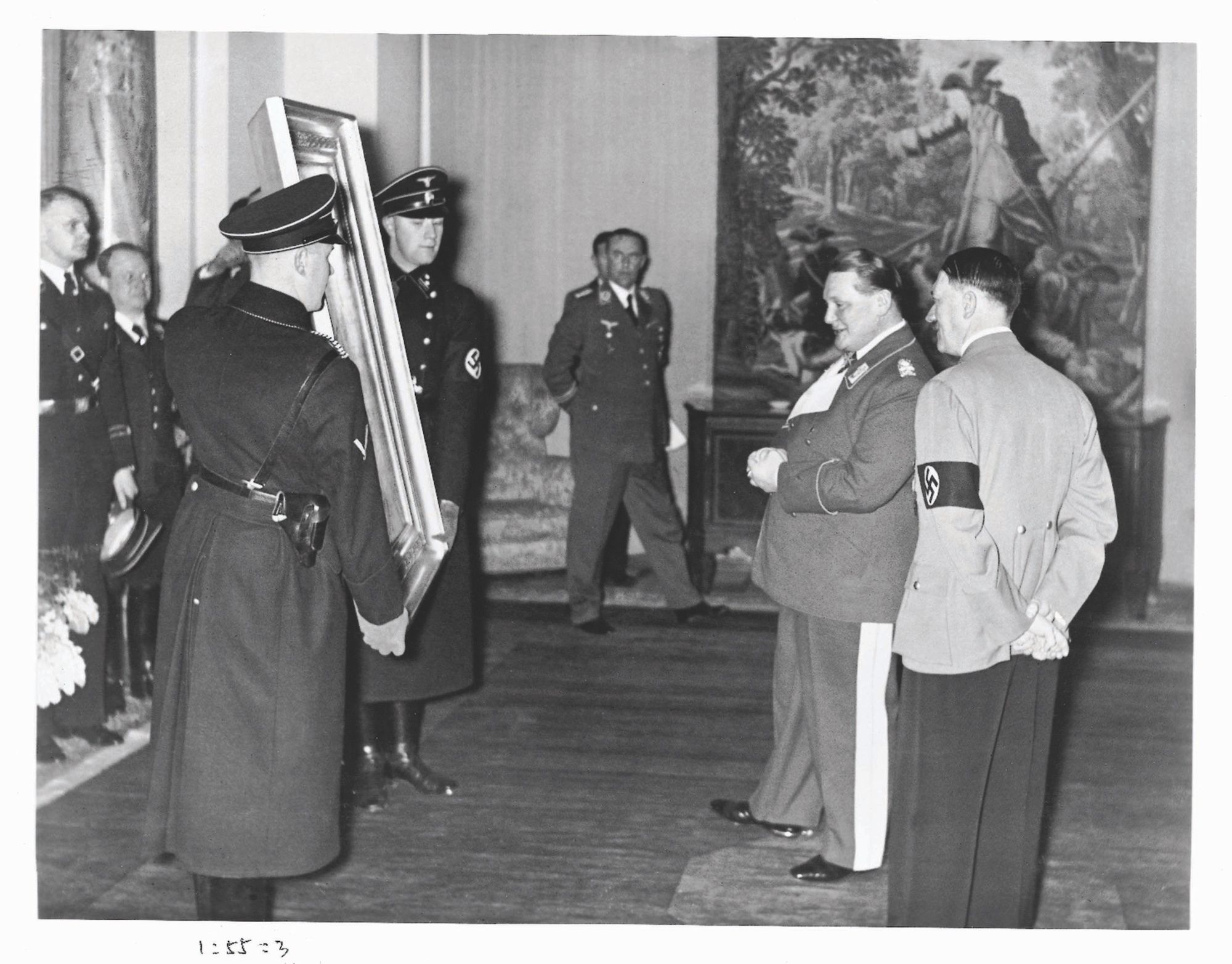 Adolf Hitler presents a Hans Makart painting to Hermann Göring as a birthday present in 1938 Library of Congress