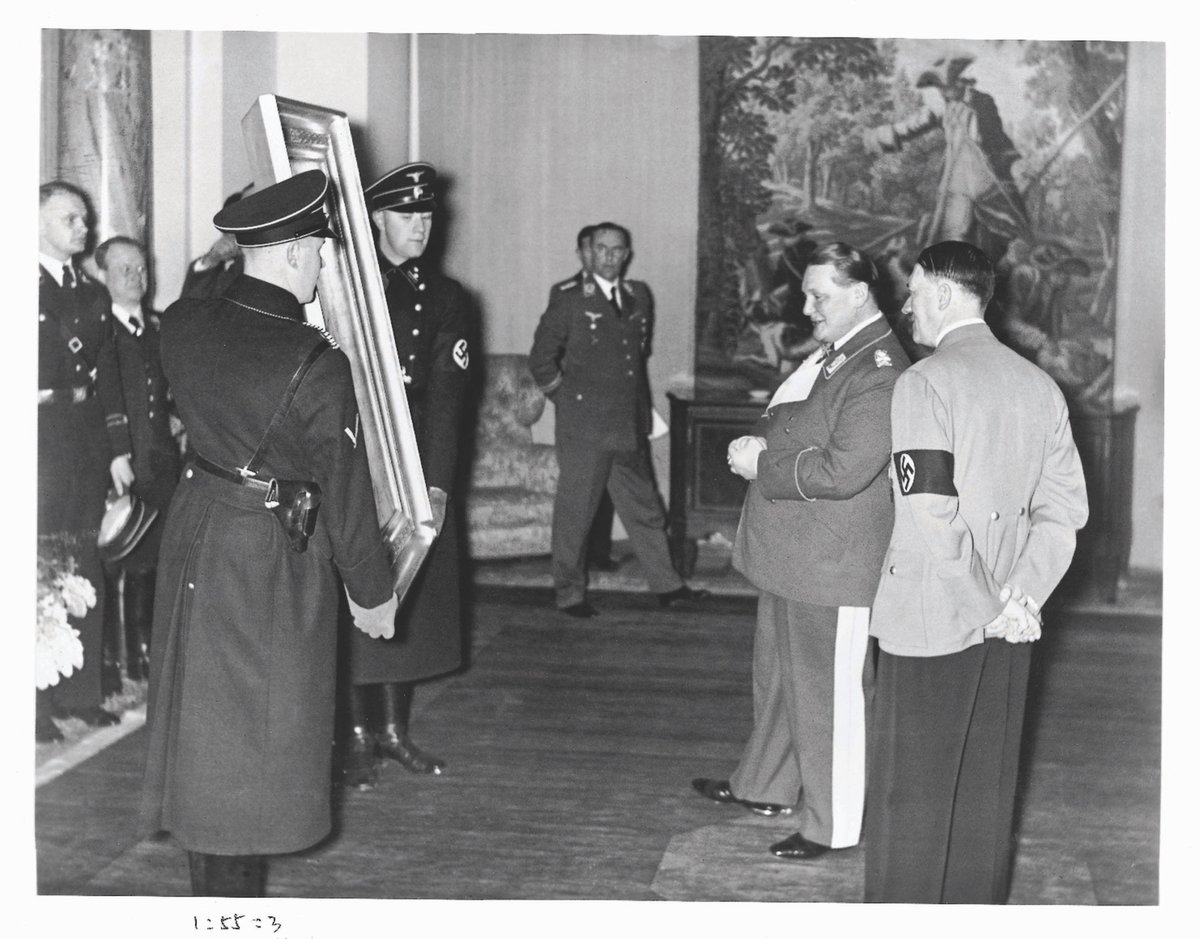 Adolf Hitler presents a Hans Makart painting to Hermann Göring as a birthday present in 1938 Library of Congress