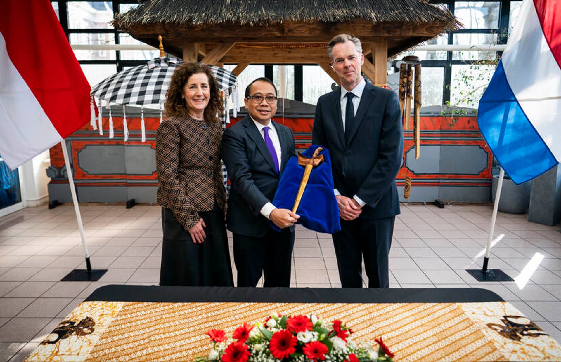 The Netherlands returned Prince Diponegoro's dagger to Indonesia last year in a ceremony attended by Ingrid van Engelshoven, the Dutch culture minister, I Gusti Agung Wesaka Puja, Indonesia’s ambassador to the Netherlands, and Stijn Schoonderwoerd, director of the Museum of Ethnology © OCW / Freek van den Bergh