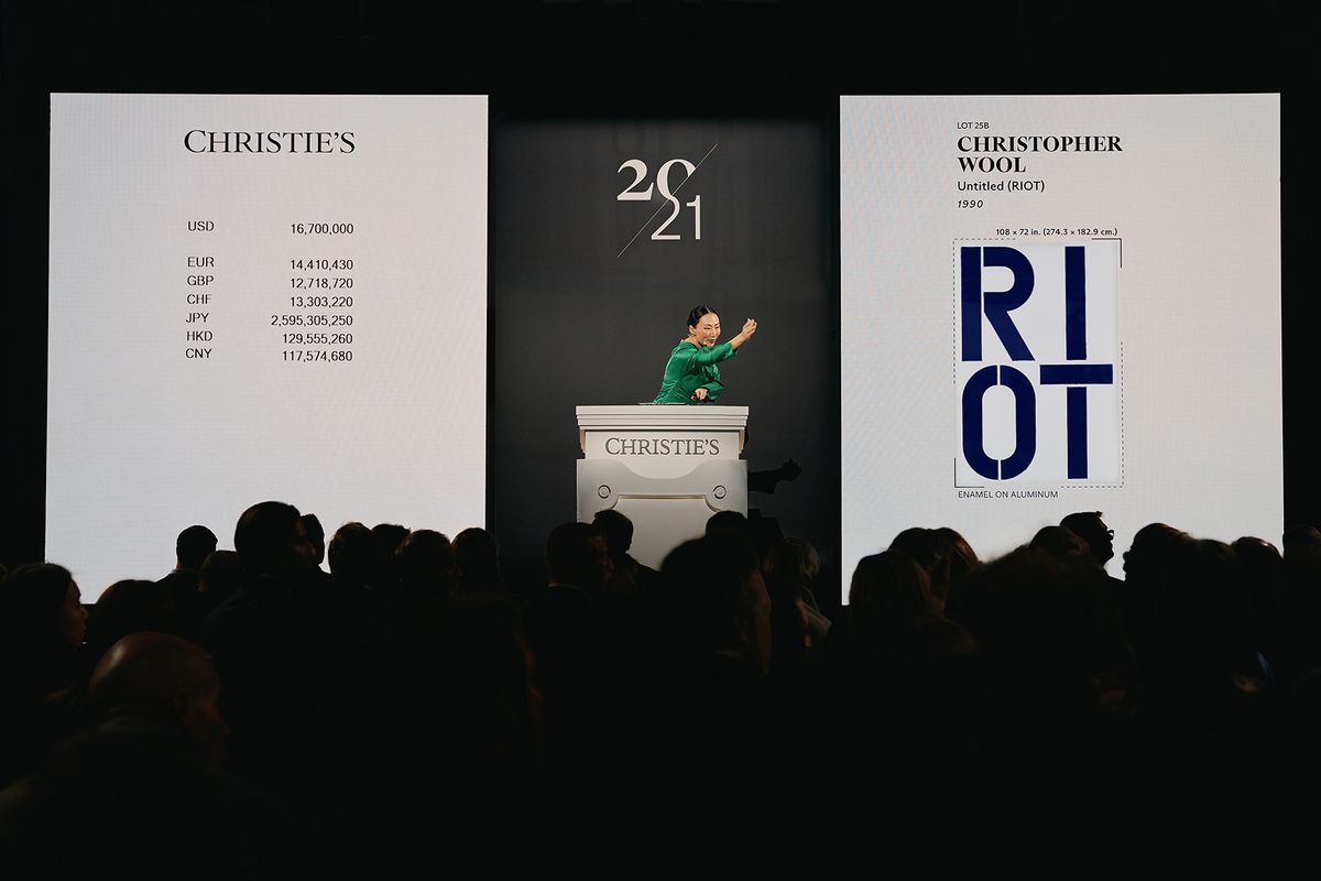 Auctioneer Yü-Ge Wang sells Christopher Wool's Untitled (Riot) (1990) at Christie's 21st century evening sale
Courtesy of Christie's