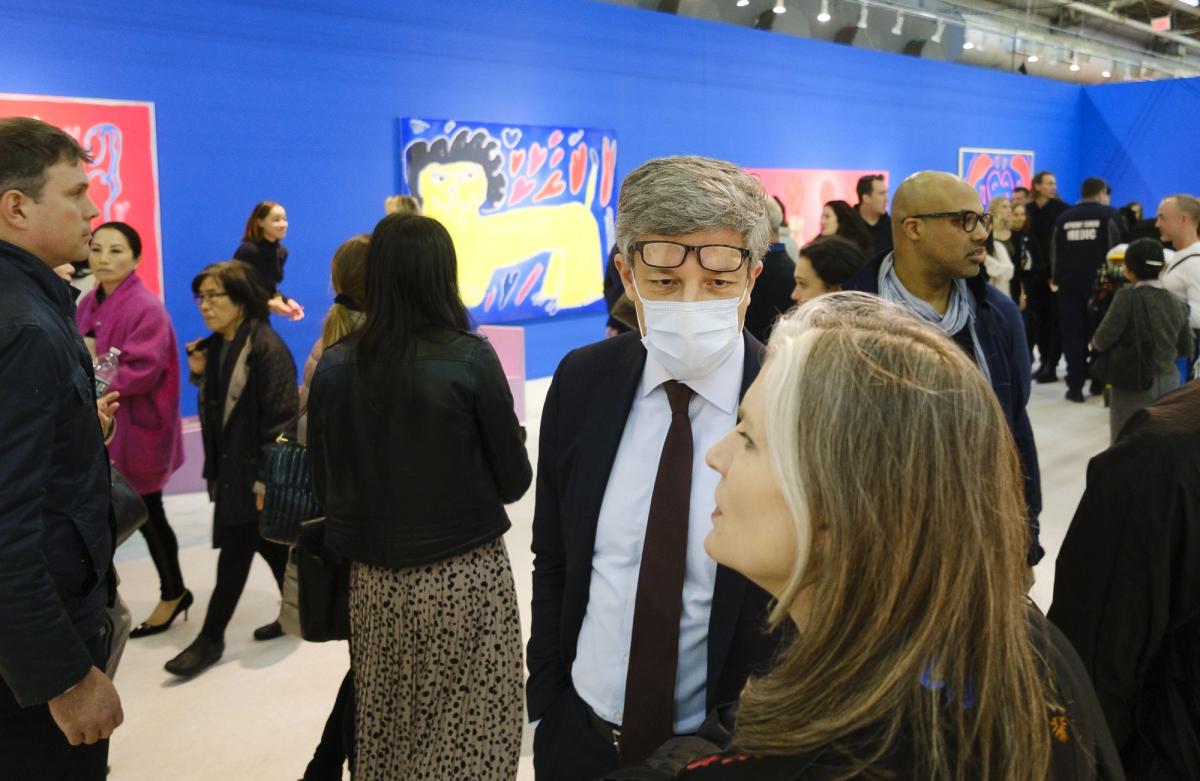 A man wears a protective face mask while visiting at the Armory Show. Justin Lane/EPA-EFE/Shutterstock