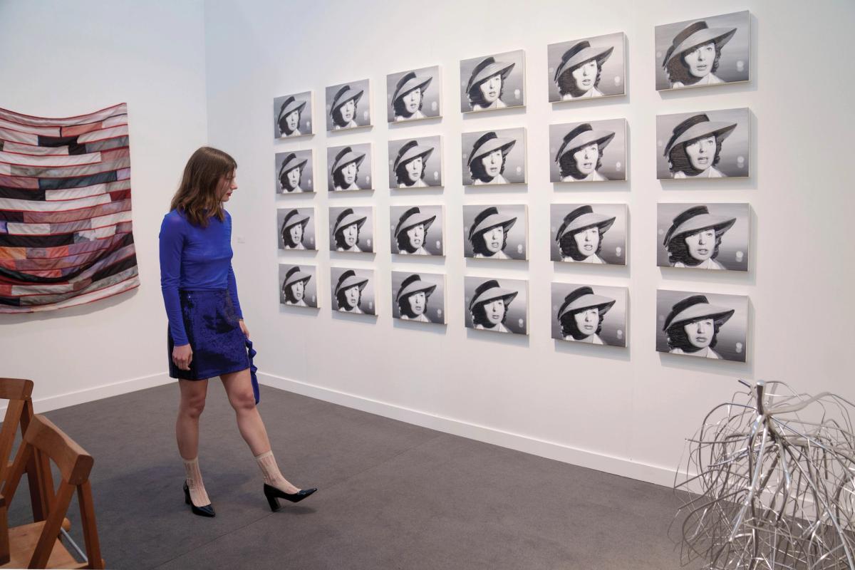 Cynthia Daignault’s God Bless You (2024)—a grid of 24 paintings—sold for $120,000 at Night Gallery Eric Thayer