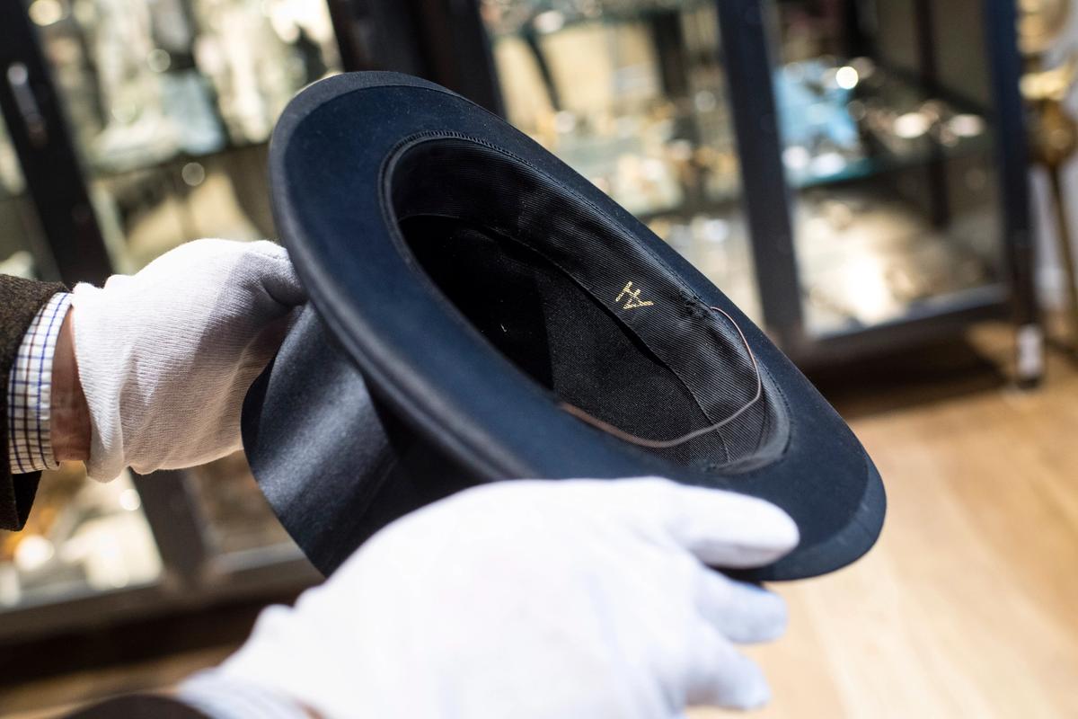 The initials "AH" can be seen in a top hat supposedly owned by Adolf Hitler in the auction house Hermann Historica Photo by: Matthias Balk/picture-alliance/dpa/AP Images