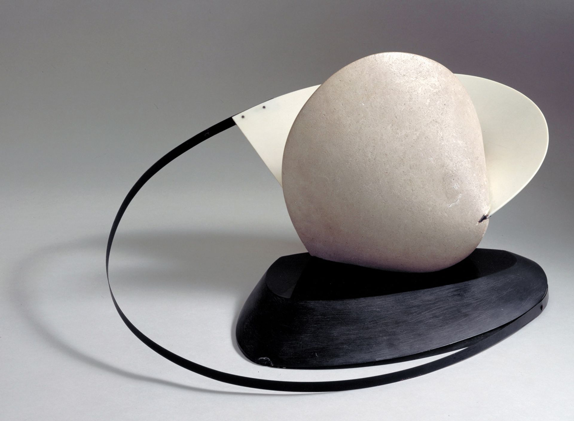 Gabo’s Construction: Stone with a Collar (1933) is made from limestone, cellulose acetate and brass on a slate base © Nina & Graham Williams; Tate, 2019
