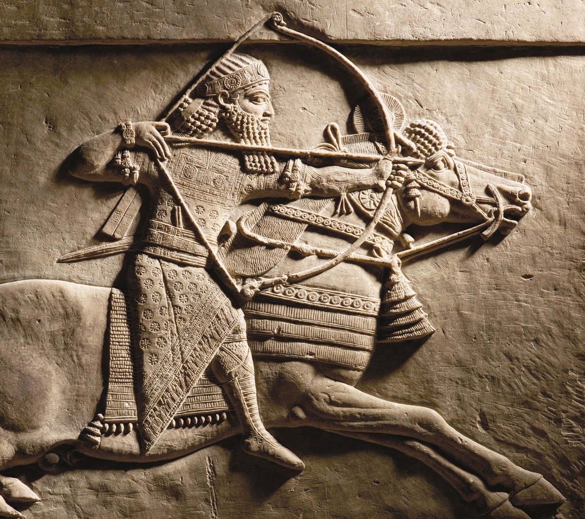 Relief of Ashurbanipal hunting on horseback (detail, 645-635BC) © The Trustees of the British Museum