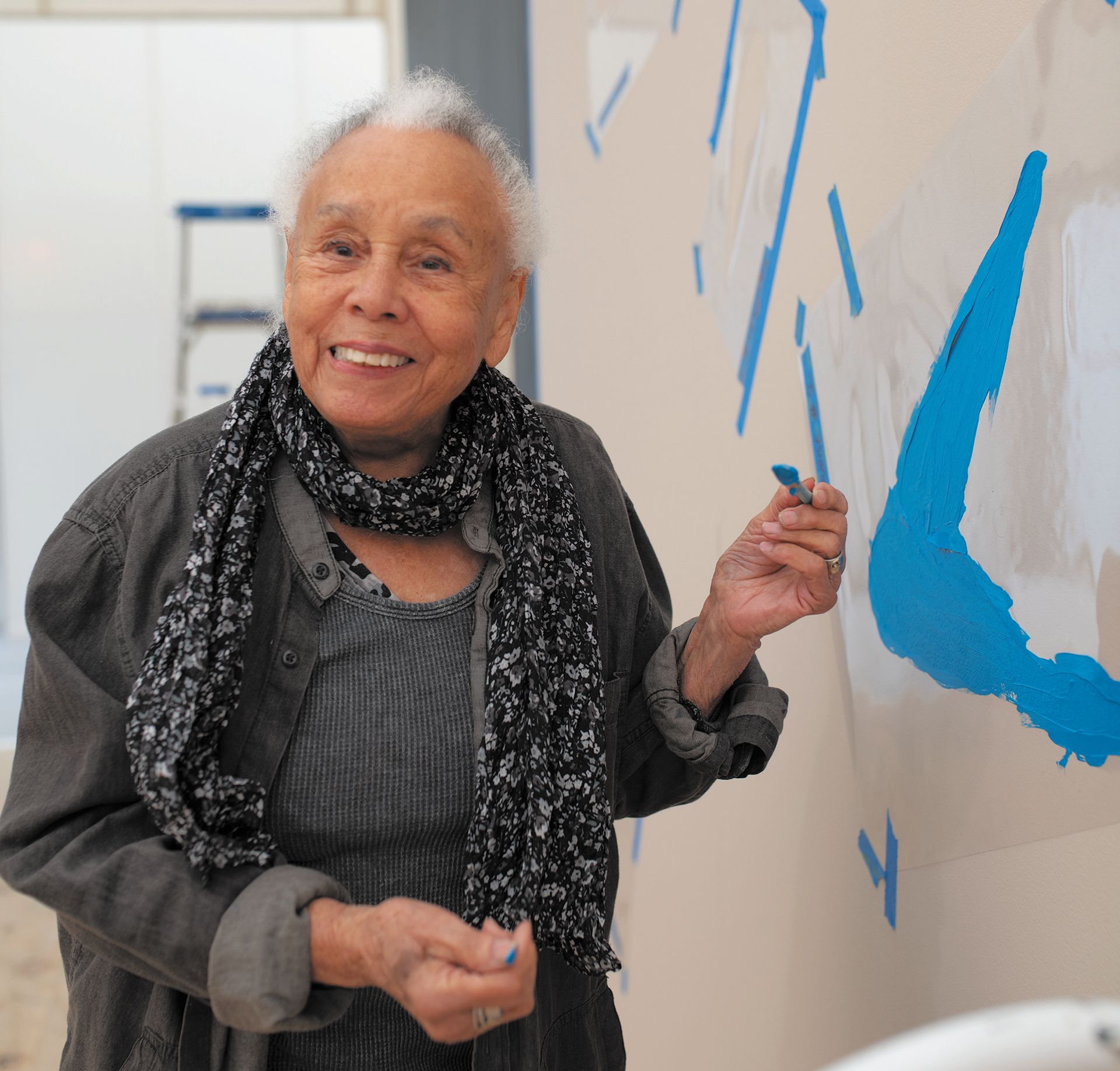 Artist Betye Saar painting her mural L.A. Energy on Roberts Projects's stand at Frieze Los Angeles. Courtesy of the artist and Roberts Projects Los Angeles, California; Photo Robert Wedemeyer
