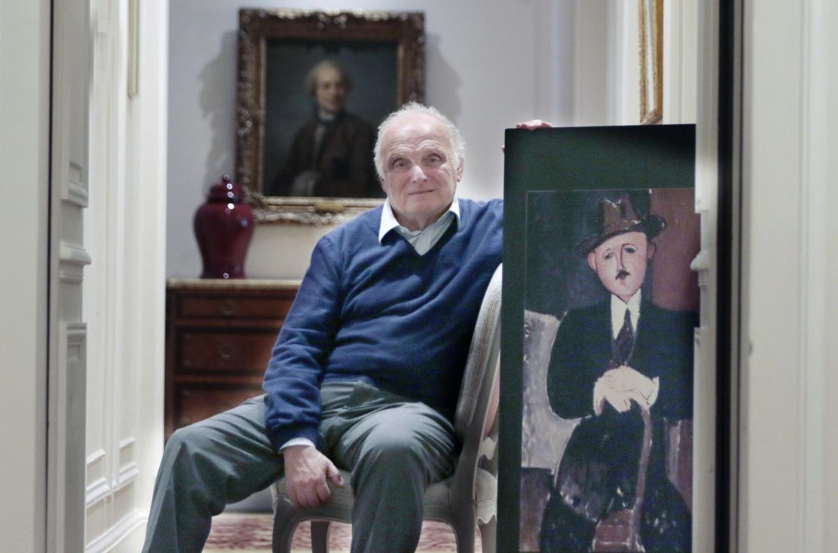 The art dealer David Nahmad with the painting by Modigliani Sipa via AP Images