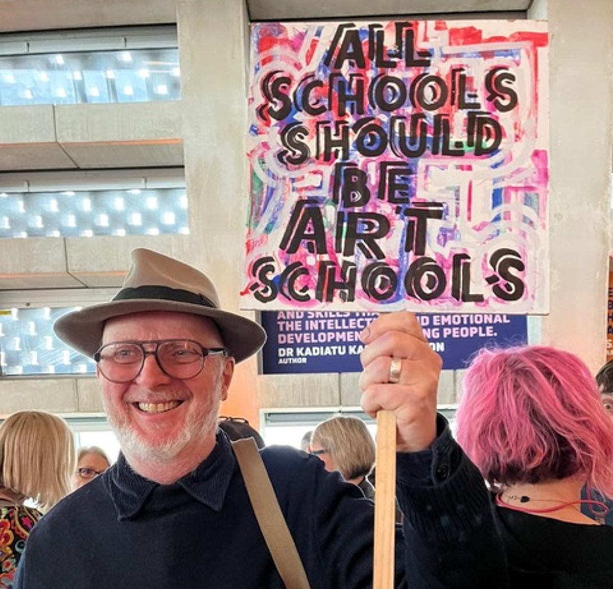 Bob and Roberta Smith shows off his homemade placard at the launch
Photo: Elizabeth Mistry 2025