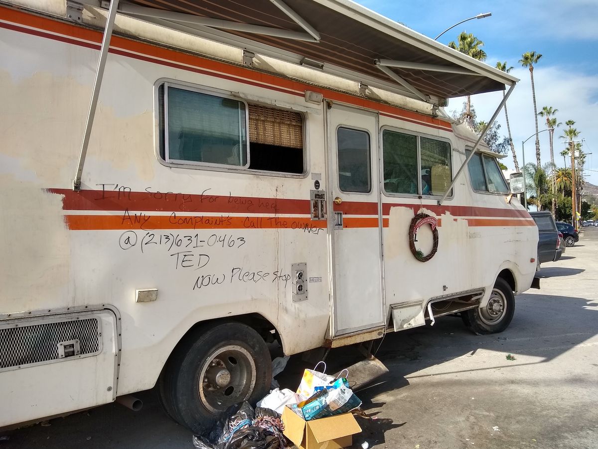 A recreational vehicle (RV) serving as a person's home on a street in Los Angeles Photo by Thayne Tuason, via Wikimedia Commons