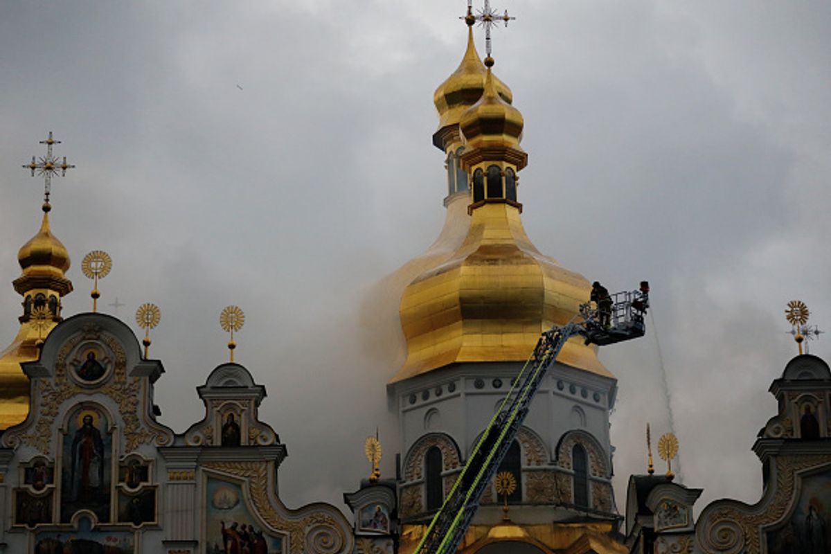 Firefighters extinguish a fire on the roof of the Dormition Cathedral of the Kyiv Pechersk Lavra hit by a Russian drone strike Andriy Zhyhaylo/Oboz.ua/Global Images Ukraine via Getty Images