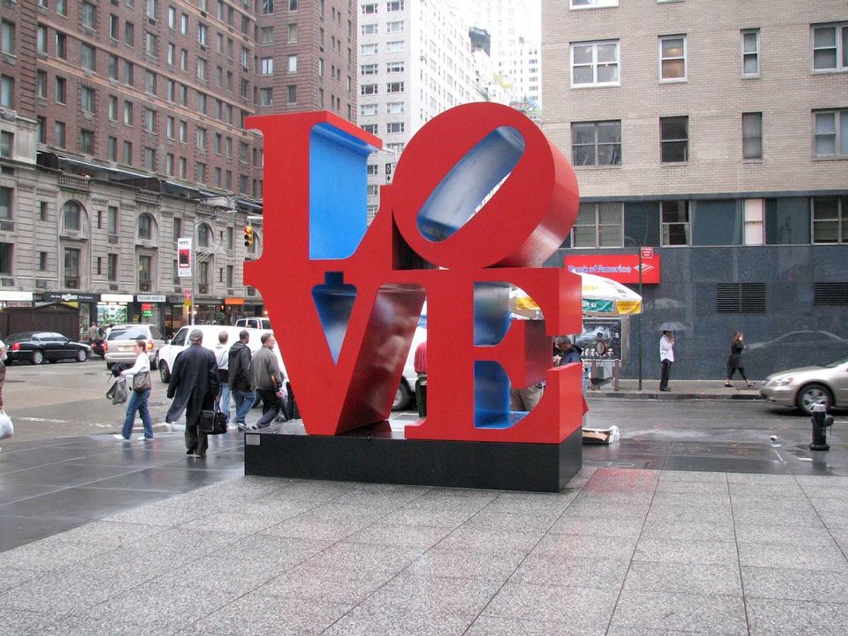 LOVE sculpture by Robert Indiana, on the corner of 6th Avenue and 55th Street in New York. 